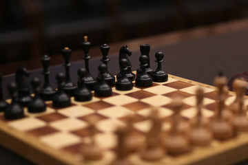 Black chess pieces at the beginning of the game