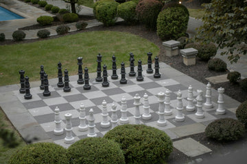 Giant chess set in the garden-liz-morgan-unsplash