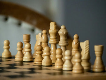 White chess pieces on a board